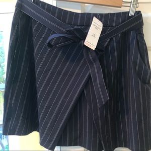 Short navy and white pin stripe skirt with pockets